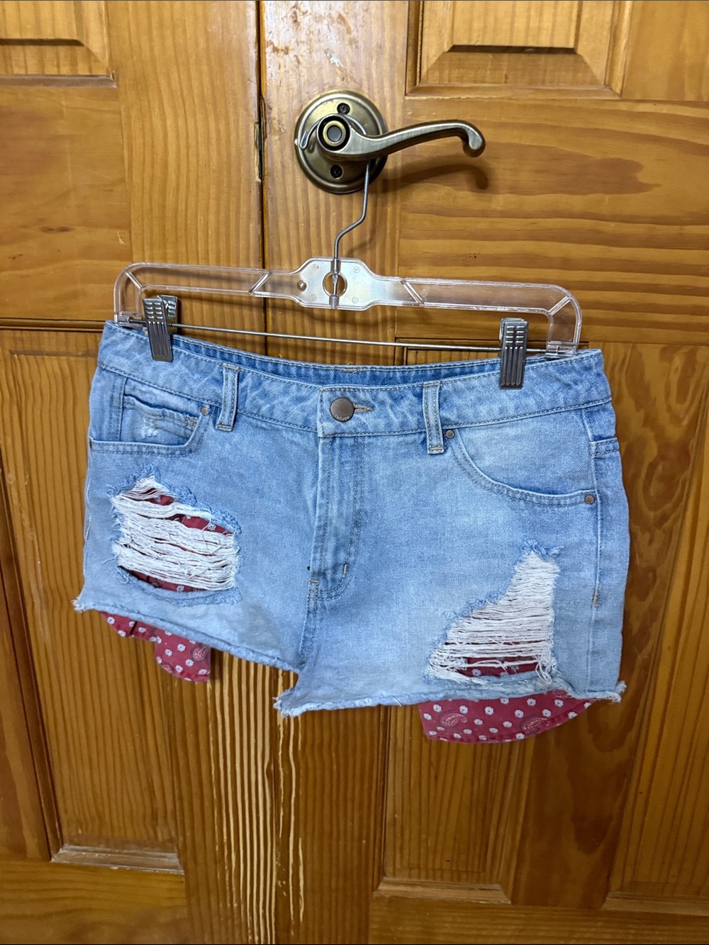 refuge Light Wash Denim Shorts with Red Polka Dot Accents